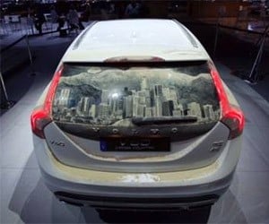Dirty Car Artist Uses Volvo Cross Country as His Canvas