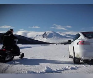 Tesla Model S P85D Races a Snowmobile Because Winter