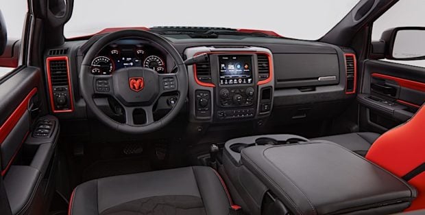 The Macho Mango exterior color of the Ram Macho Power Wagon also brightens the interior, accenting the steering wheel Ram logo and the trim on the gauges, HVAC, infotainment center and side door panels.