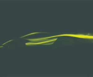 Lotus Teases Type 130 EV Hypercar with Wispy Green Smoke