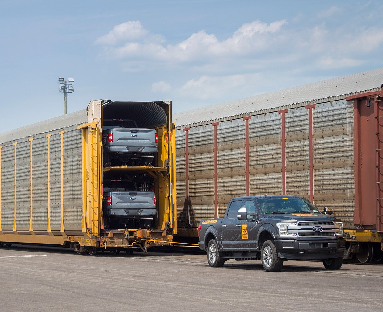 Ford’s Electric F-150 Pickup Truck Tows a Train