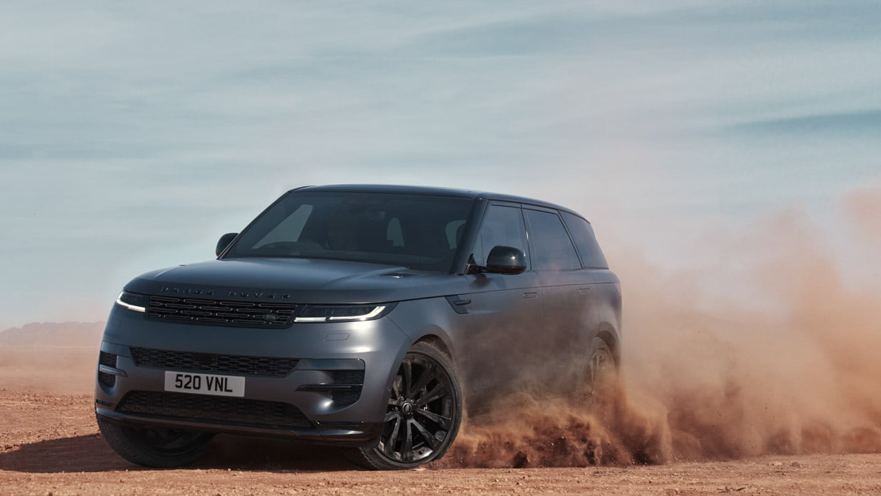 2025 Range Rover Sport Stealth Pack Driving in Sand